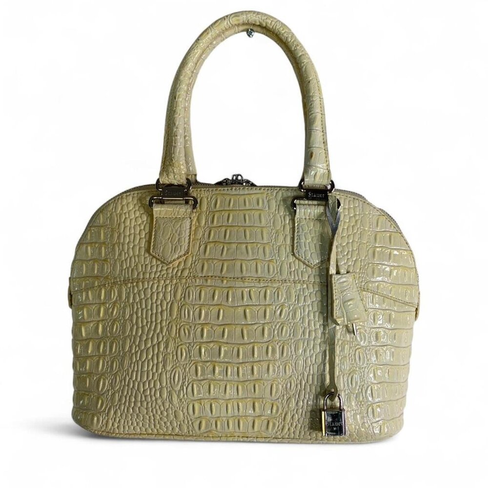 Vintage Stauer beige handbag featuring
